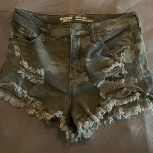Camo distressed shorts.